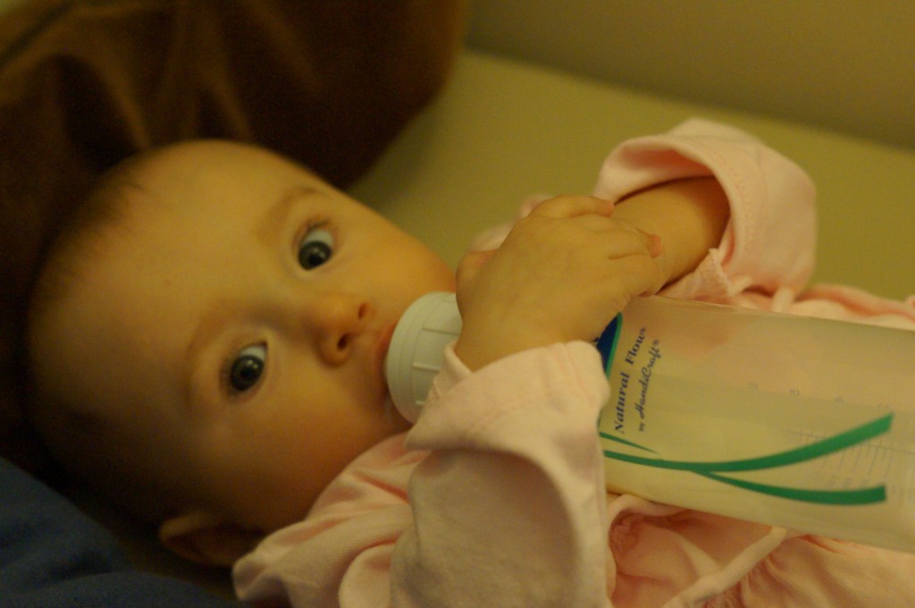 Holding her bottle